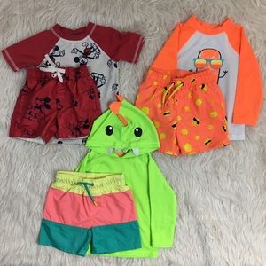 3 matching swimsuits toddler boy
